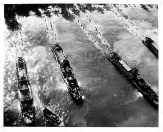 Untitled (LCI's unload troops on red beach at Morotai Island, September 1944)