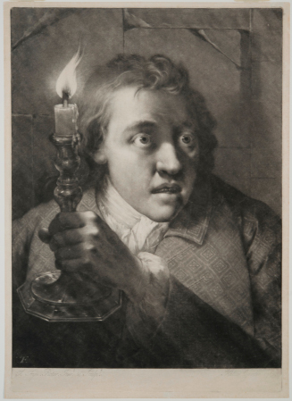 (Young man holding a candle)