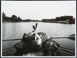 Untitled (Boy resting in a rowboat)
