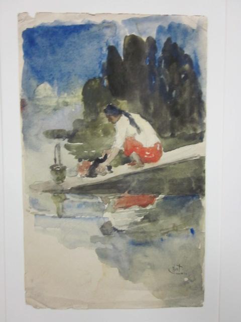 Woman Washing Clothes at Water's Edge