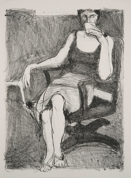 Seated Woman Drinking From a Cup