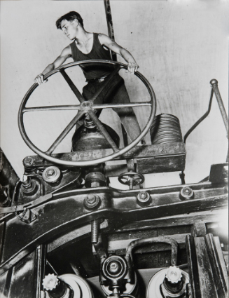A Komsomol Member At The Steering Wheel