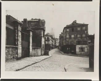 (Paris: Montmartre scene with Dome of Sacrè-Coeur in background)