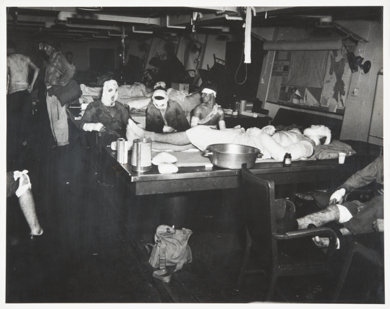 Untitled (Ward room of USS Suwannee being used as emergency sick bay)