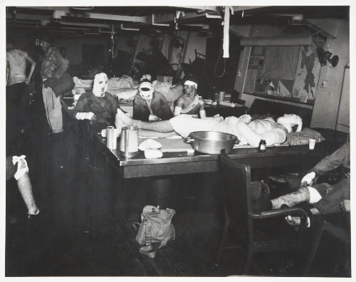 Untitled (Ward room of USS Suwannee being used as emergency sick bay)