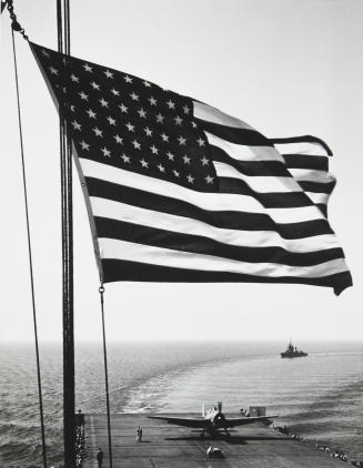 The American Flag Flies Over the USS Santee