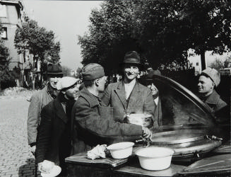 Soviet Soldiers Feeding The Inhabitants Of Berlin