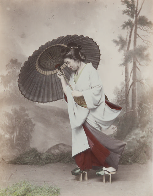 [Woman with Umbrella]