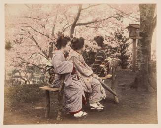 (Three Japanese Girls Seated near Blossoming Trees)