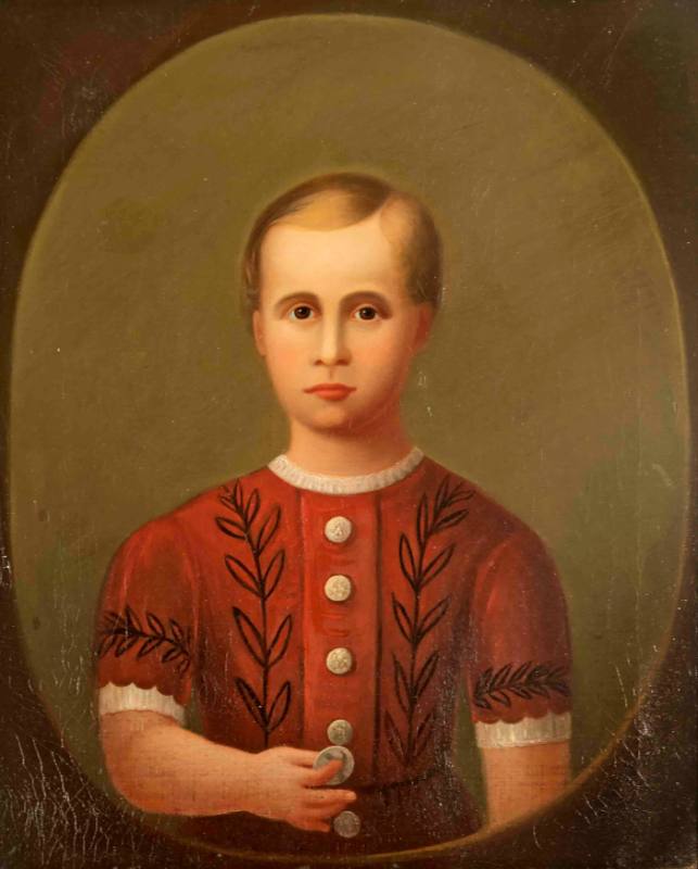 Untitled (Boy in red holding a medal)
